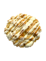 Lemon Vanilla Cream New York-style cookie with Lemon Oreo pieces, white chocolate chips, and white chocolate drizzle